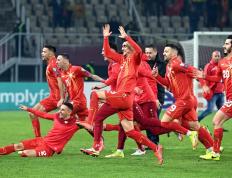 开云下载-北马其顿队奋力拼搏，成功跻身晋级